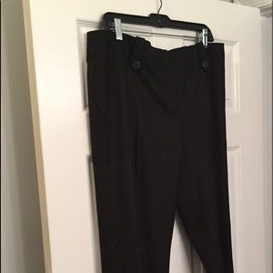 Deep dark brown slacks.